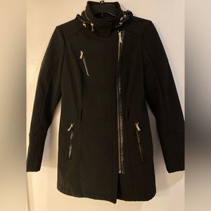 Michael Kors Jacket with quilted details and gold zippers.